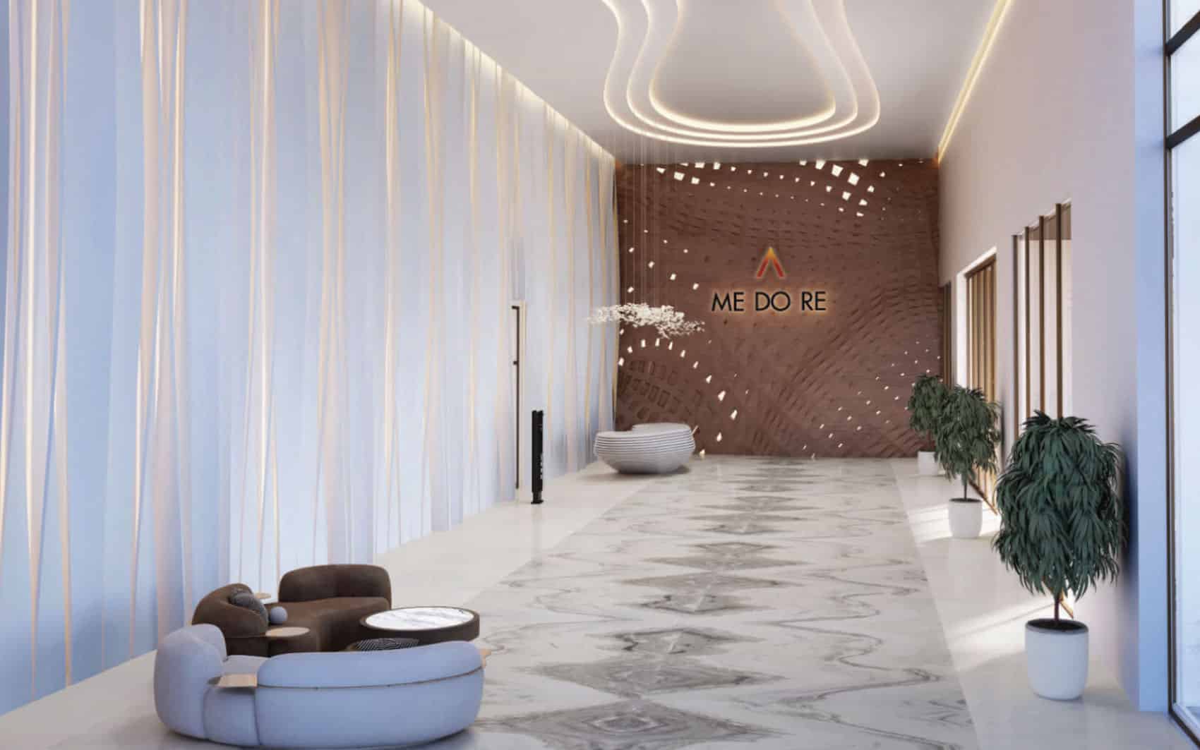 Modern building lobby with sculptural furniture and ambient lighting