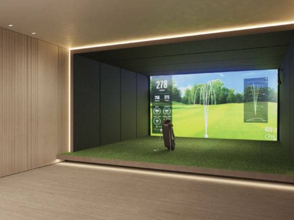 Indoor golf simulator with digital screen and putting area