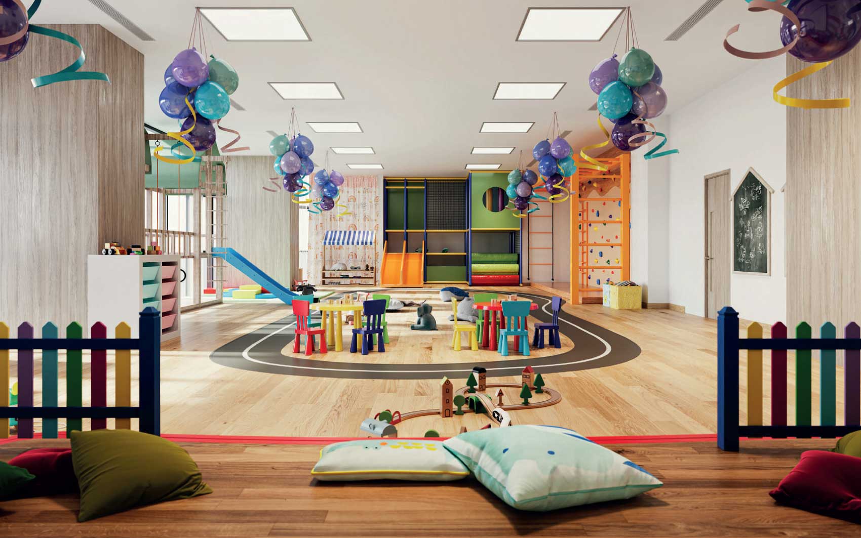 Colorful indoor kids’ play area with slides, balloons, and activity tables