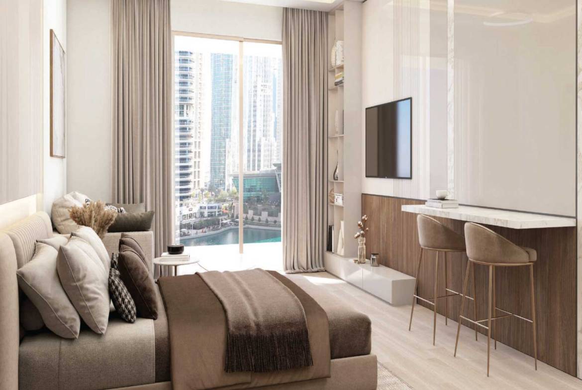 Elegant bedroom suite with soft lighting and marina skyline view