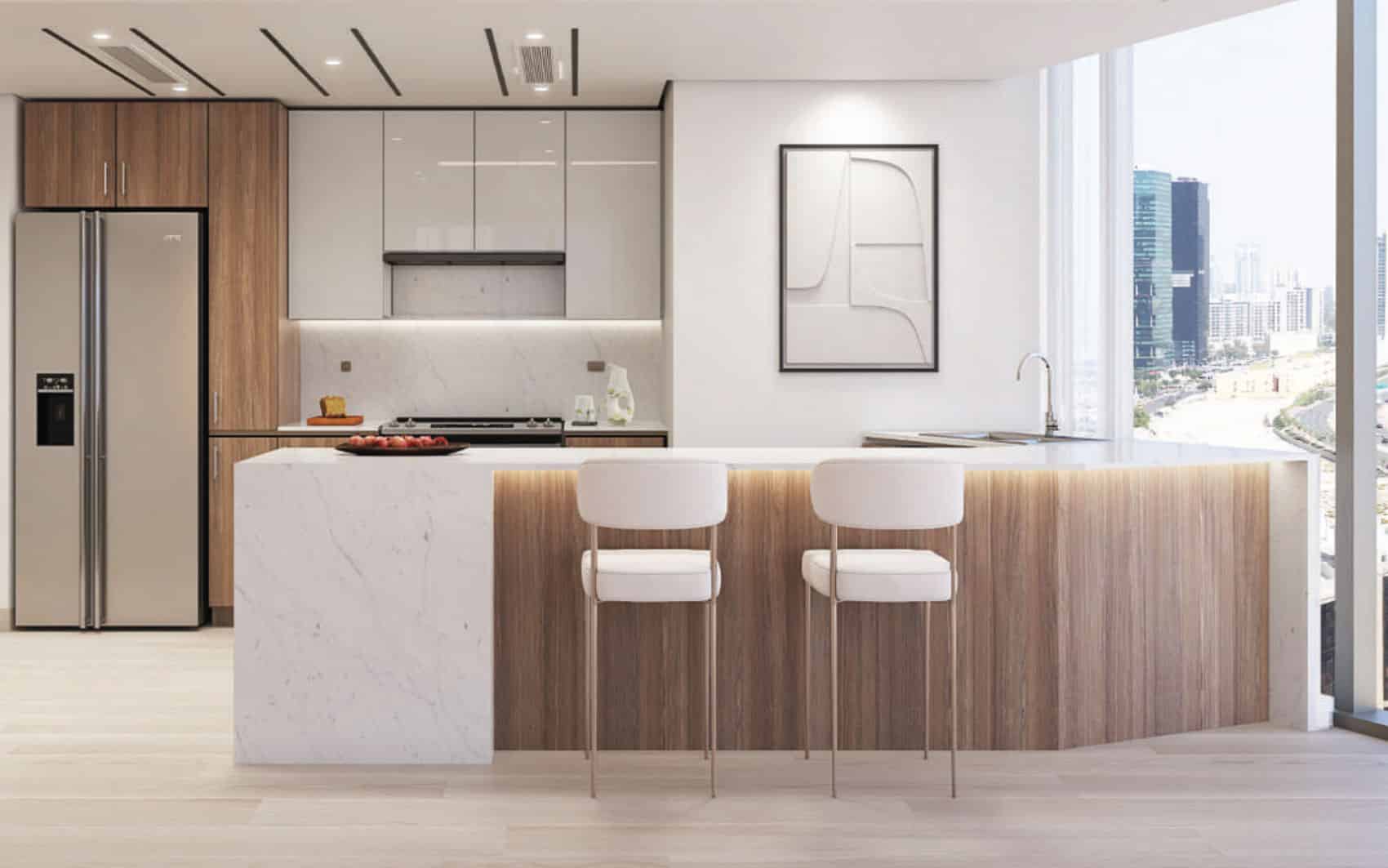 Modern kitchen with marble island and panoramic city view