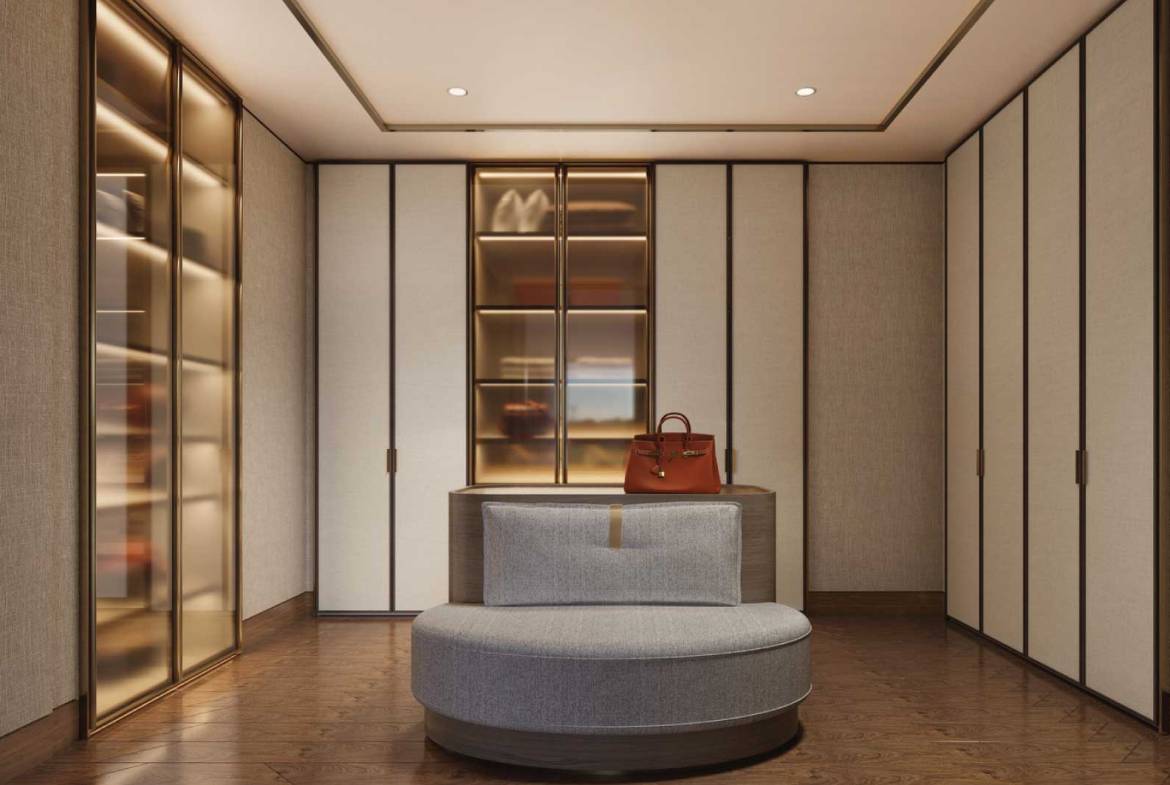 Elegant walk-in wardrobe with glass cabinets and round seating