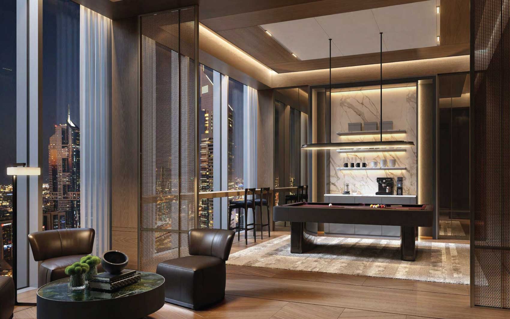 Elegant penthouse game room with pool table, marble bar, and panoramic city skyline views at night