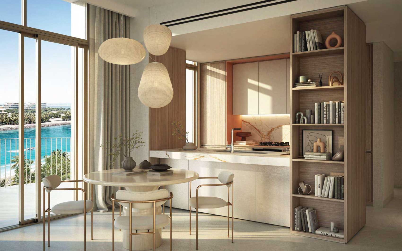 Modern kitchen with round dining table, built-in shelving, and panoramic sea view