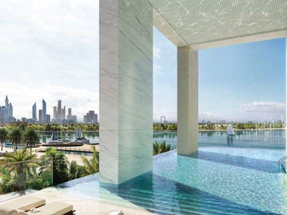 Infinity pool with panoramic city skyline and marina views