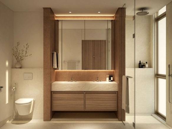 Luxury bathroom with double vanity, glass shower, and warm ambient lighting