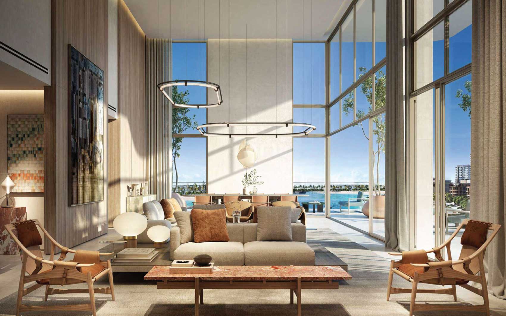 Modern living room with high ceilings, large windows, and oceanfront view