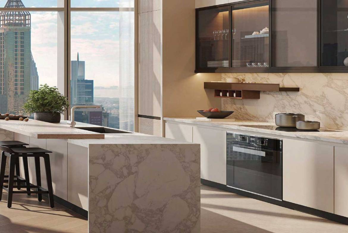 Contemporary kitchen with marble island, skyline views, and high-end appliances