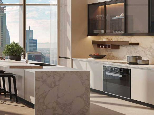 Contemporary kitchen with marble island, skyline views, and high-end appliances