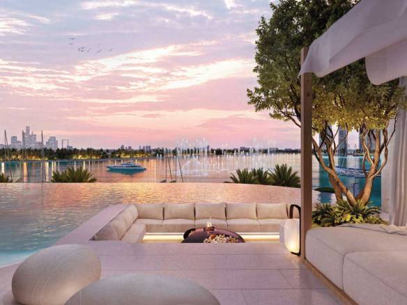 Luxury waterfront terrace with infinity pool, sunken seating, and city skyline at sunset