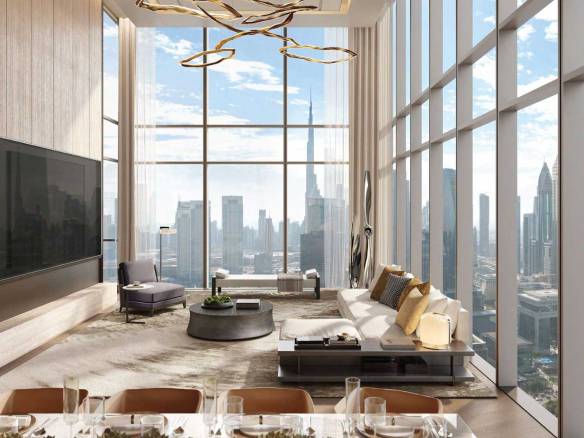 Elegant living room with double-height windows overlooking Dubai skyline