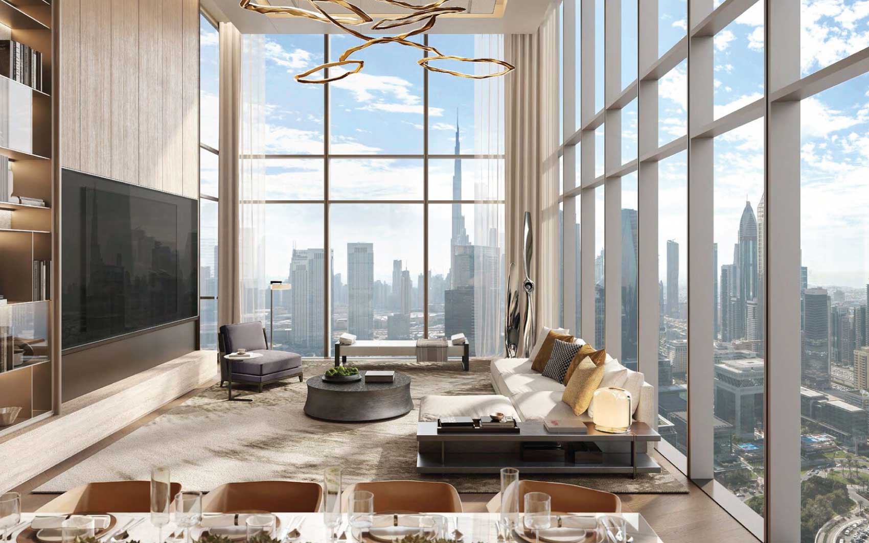 Elegant living room with double-height windows overlooking Dubai skyline
