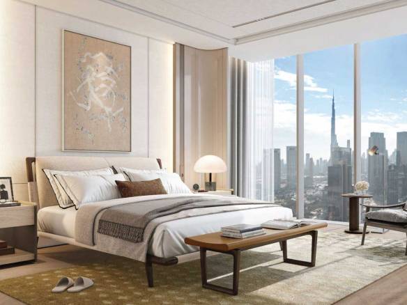 Luxury bedroom with floor-to-ceiling windows and Burj Khalifa view