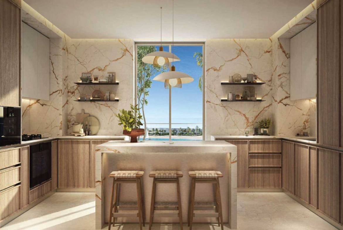 Contemporary kitchen with marble backsplash, wooden cabinetry, and ocean view