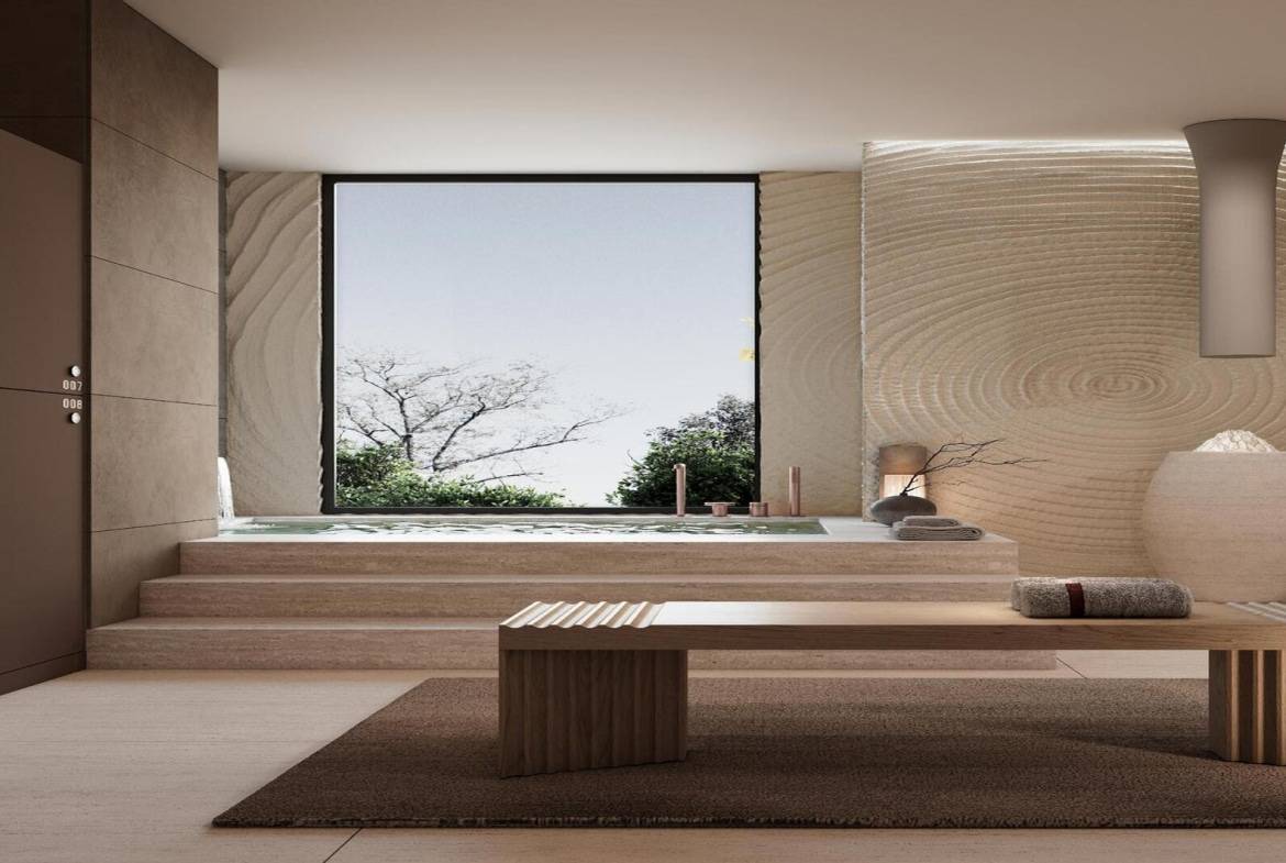 Minimalist spa room with wooden bench, textured walls, and private hot tub