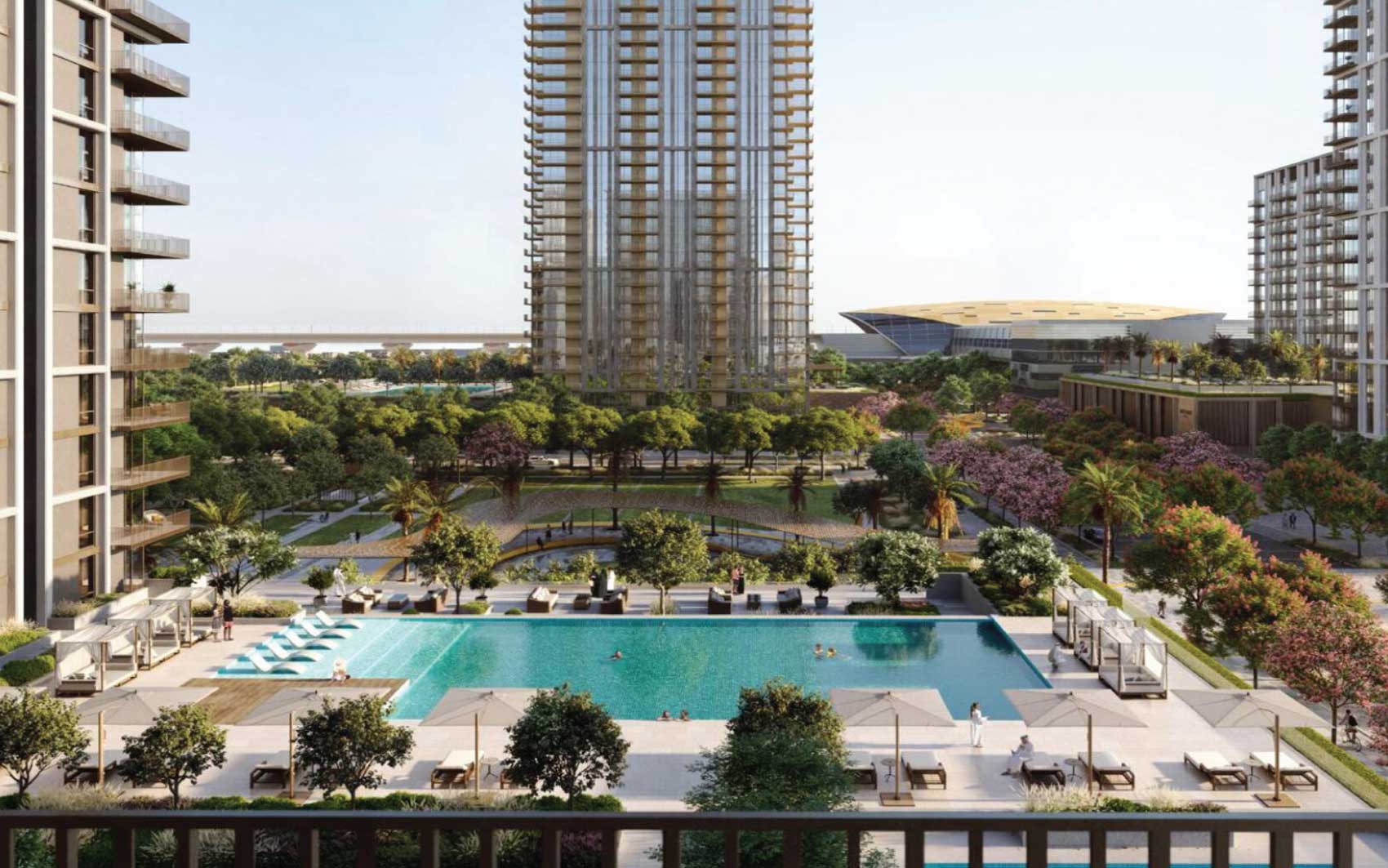 Modern residential complex with central swimming pool and landscaped gardens