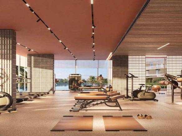 Spacious modern gym with large windows and premium fitness equipment