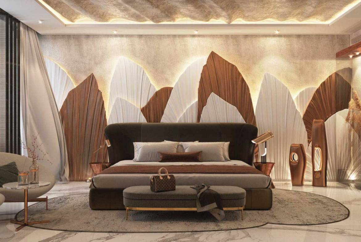 Luxurious bedroom with sculptural wall design, plush seating, and marble floors in warm tones