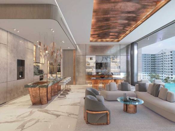 Elegant living room with copper-accented kitchen island and infinity pool view