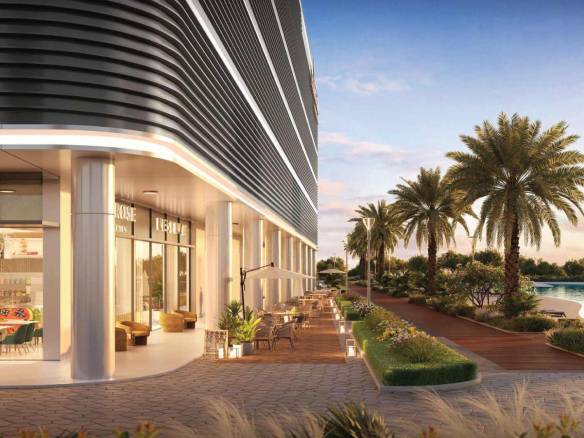 Upscale retail and dining promenade with outdoor seating and palm-lined walkway