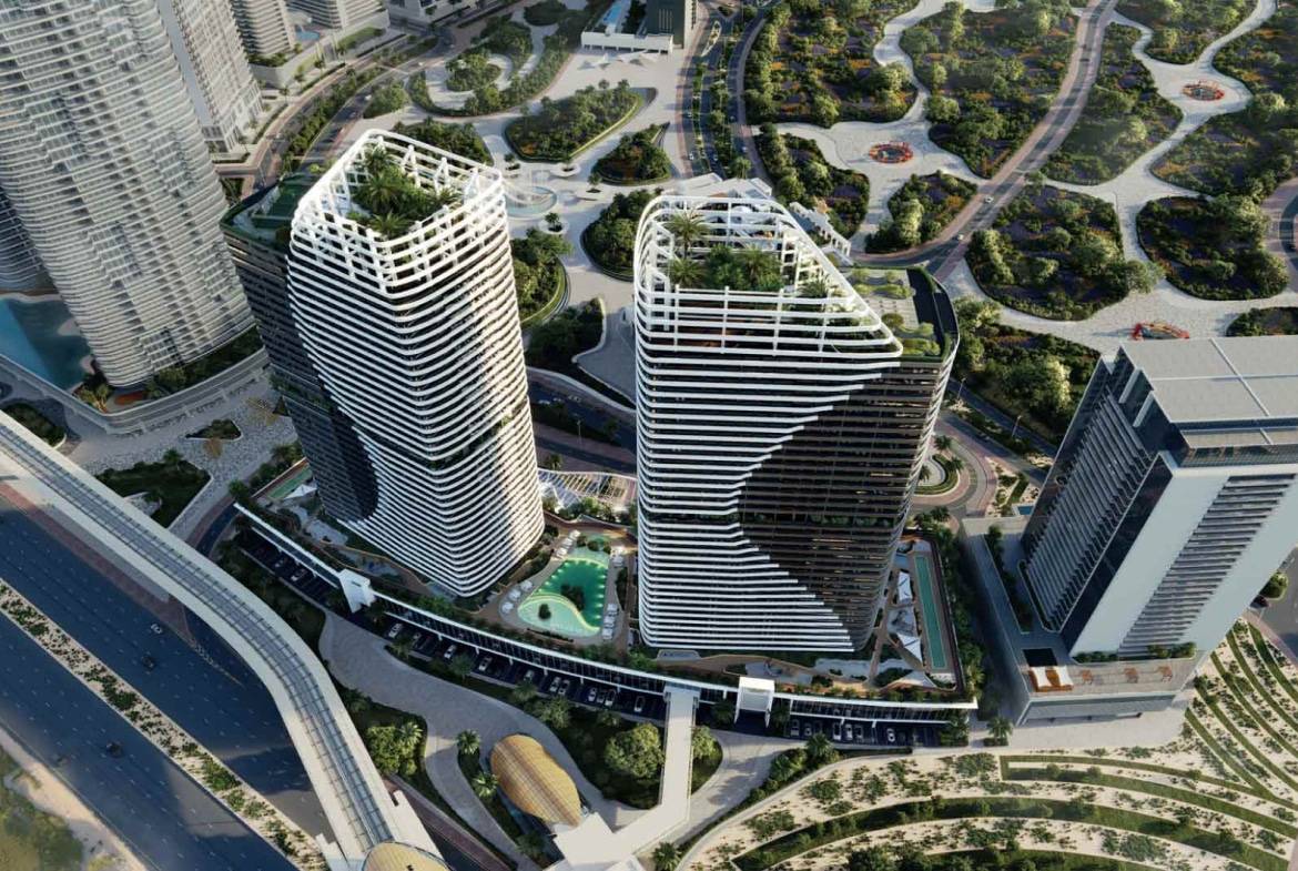 Aerial view of twin modern skyscrapers with rooftop gardens and surrounding cityscape