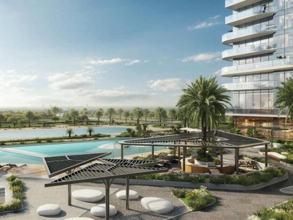 Resort-style outdoor pool area with palm trees and modern seating spaces