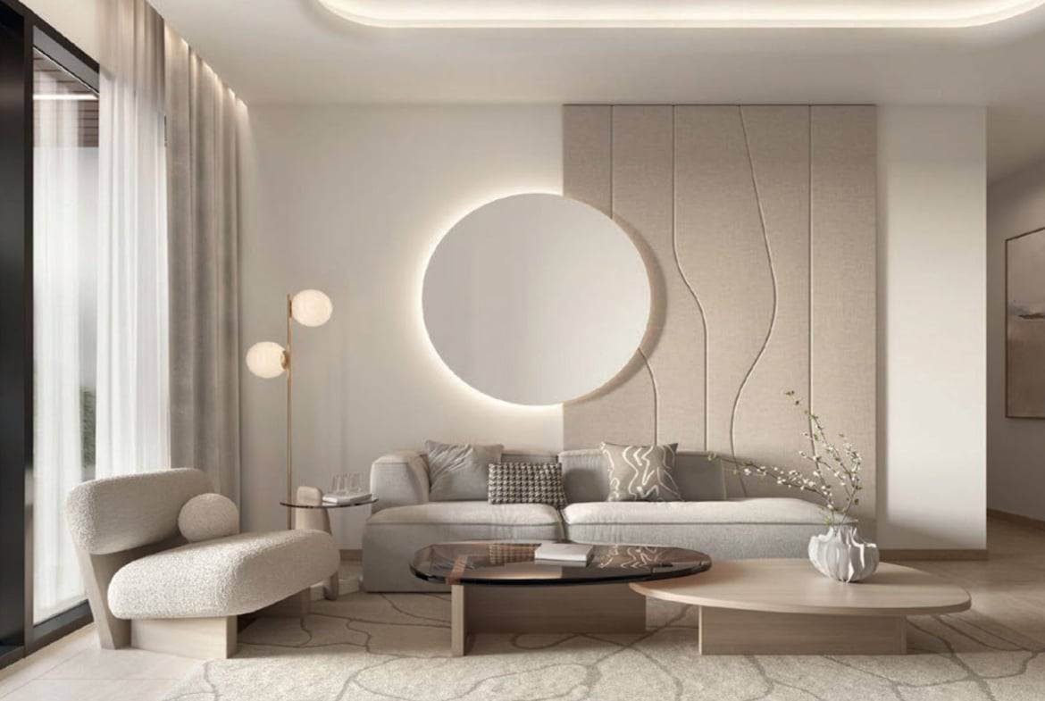 Minimalist modern living room with circular wall light and neutral-toned furniture