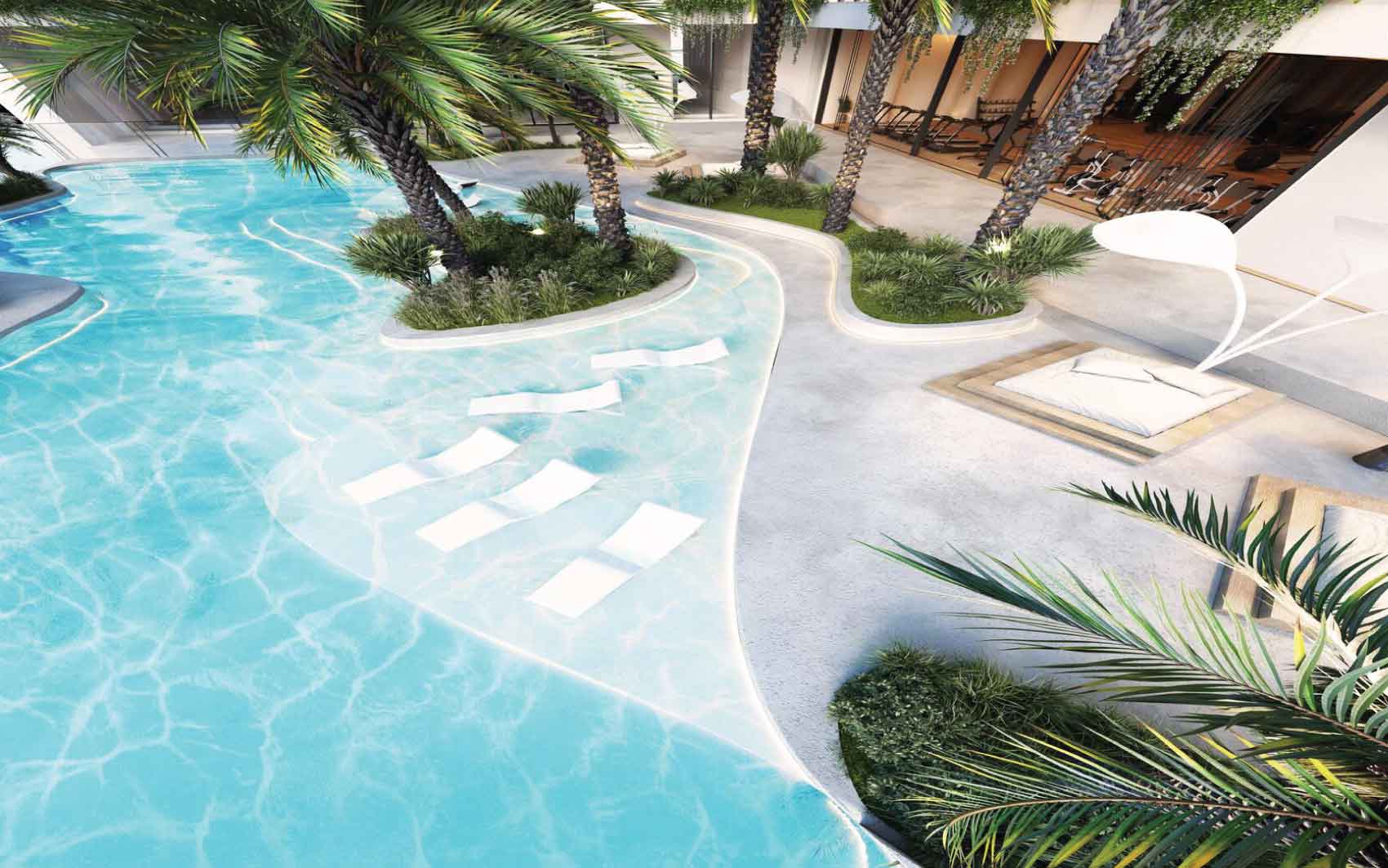 Luxury resort-style pool with palm trees and sun loungers in shallow water