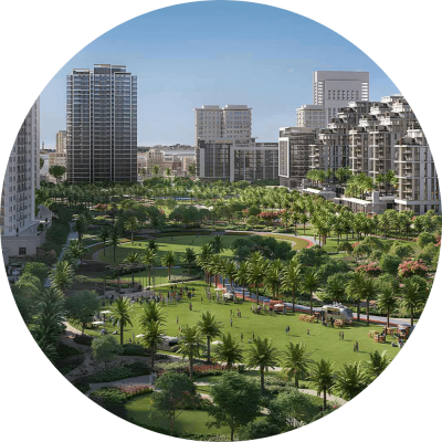 A park bordered by tall buildings and lush trees, creating a serene urban oasis